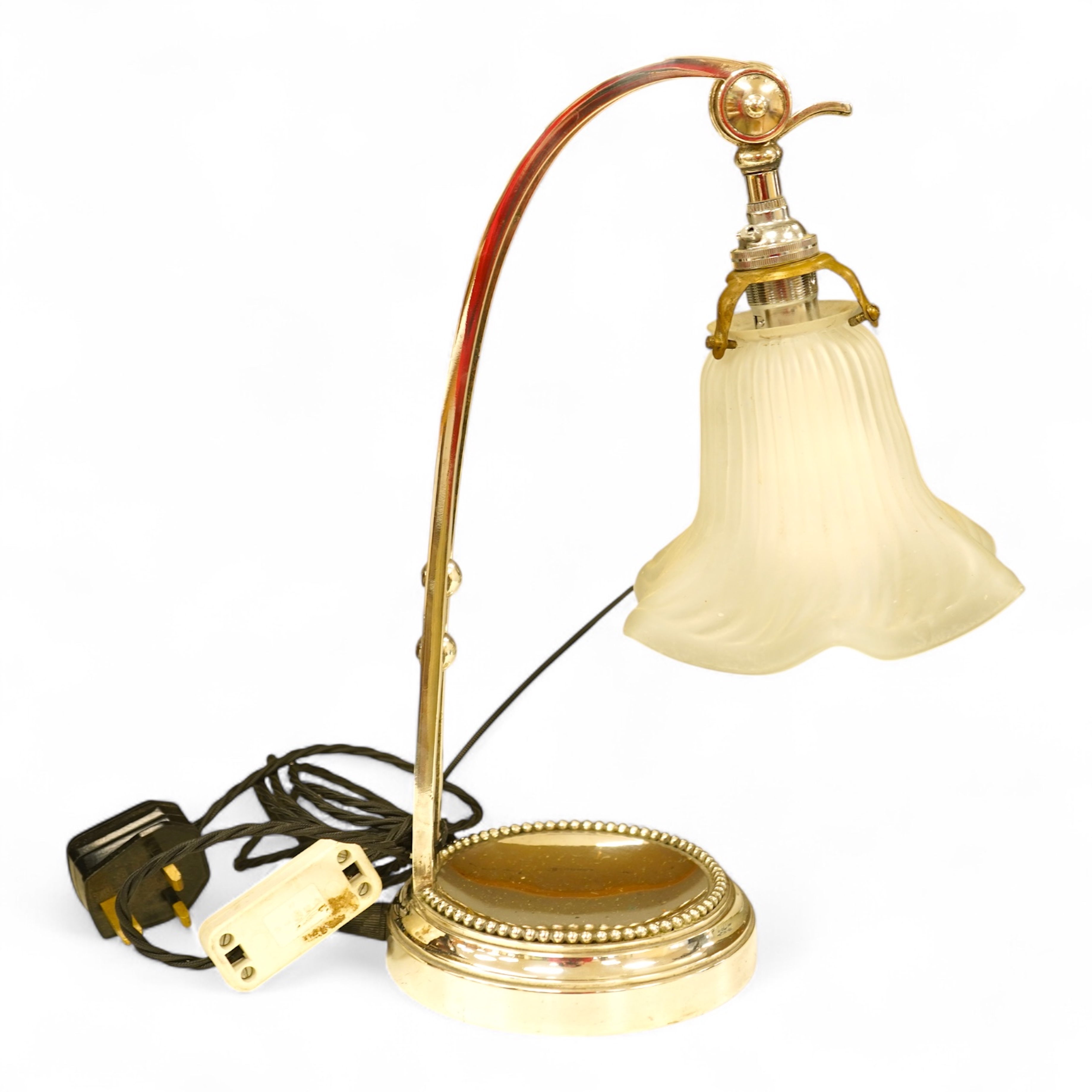 A plated adjustable desk light with opaque glass fluted shade, 35cm high